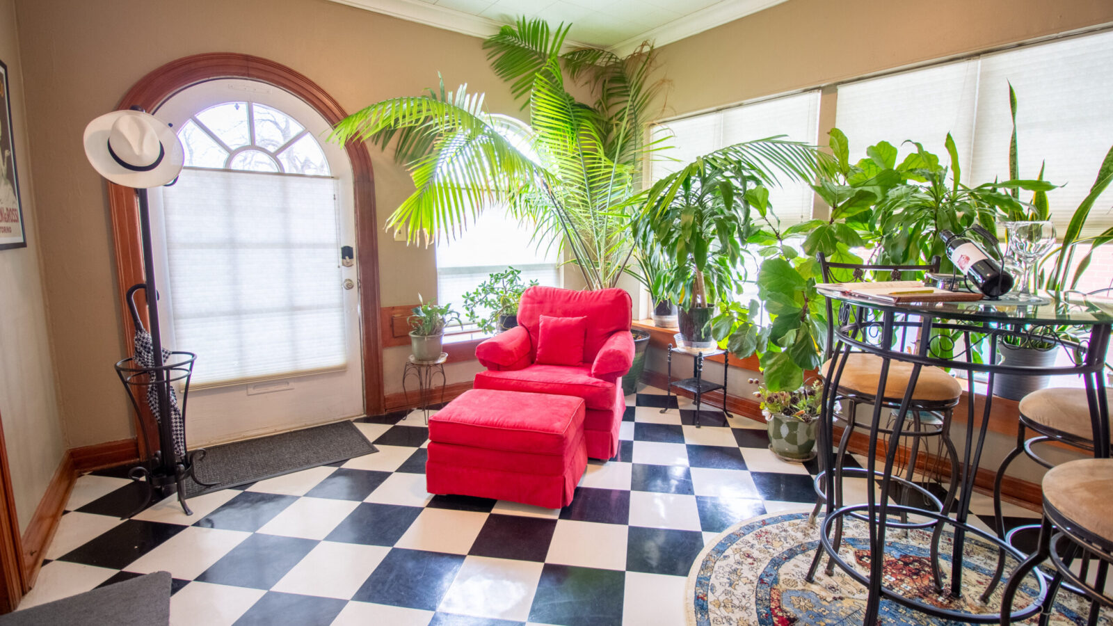 Entry parlor at Vintage Charm OKC featuring vintage décor and cozy seating